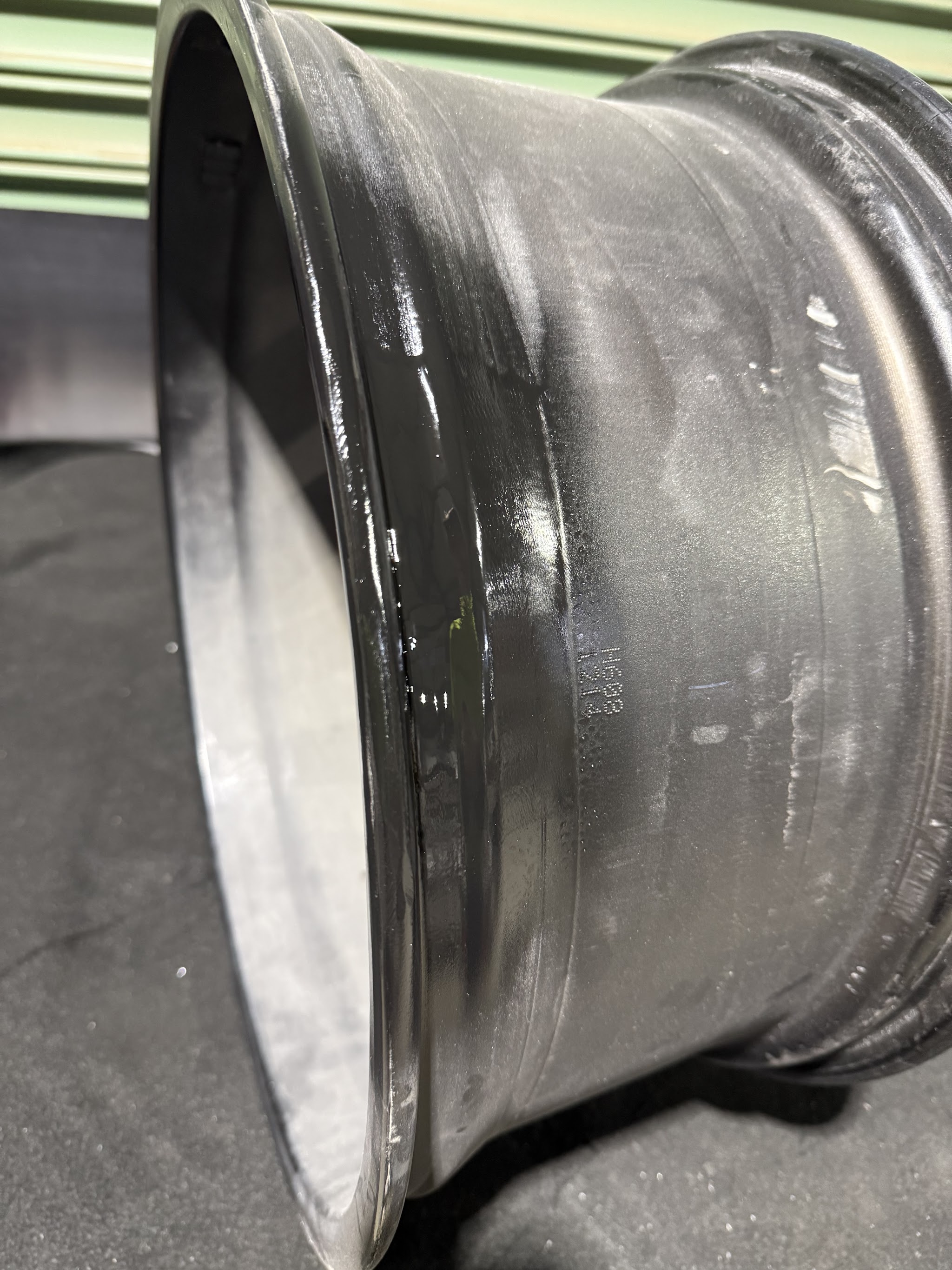 Gloss black refinished wheel barrel